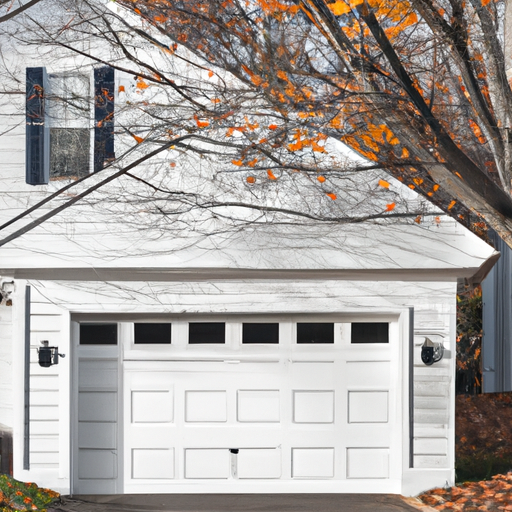 Suburban New England garage door on a residential home in Andover, MA at dawn, showing panels and hardware without people.